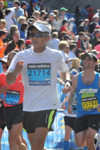 Dr. Kazuhiro Oka at the Boston Marathon in 2014.